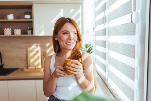 How can I maximize natural light without adding more windows
